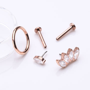 Detail View 1 of 3 Pcs of Assorted Titanium Rose Gold Brilliant Marquise Stud & Clicker Package